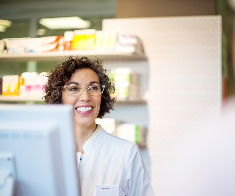 Pharmacist at a computer